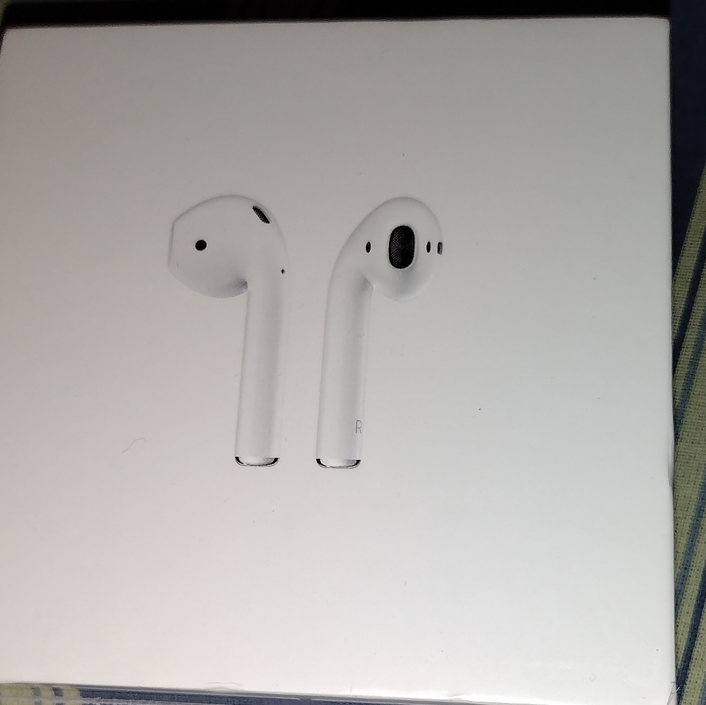 Brand new, never been opened Air Pods. Plastic wrap is still on the box itself